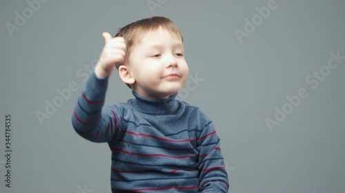 Video of little nodding four-year boy