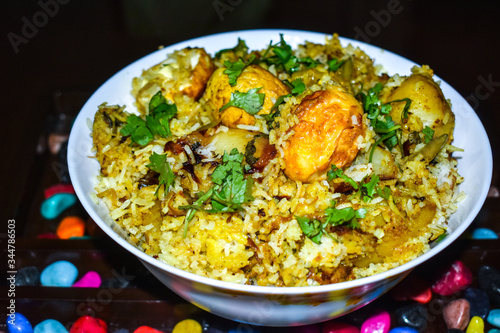 Beautiful and yummy egg biryani in a bowl image on this festival