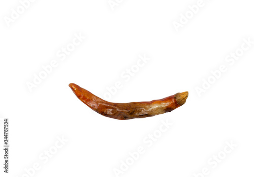 Rotten dried red chili isolated on white background