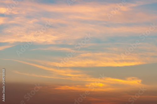 Dramatic cloudy sky during sunset, Texture of bright evening sky in twilight time background © somchairakin