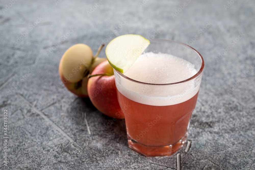 Drink from apples in a glass, transparent glass Drink from apples in a glass, transparent glass