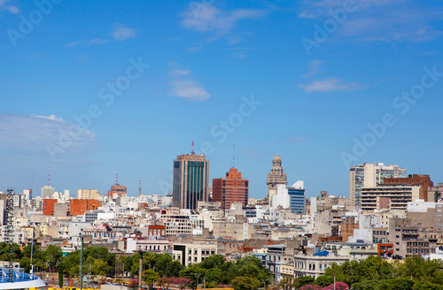 Montevideo, Uruguay, view of the city from the port. The port of Montevideo is the main commercial port of Uruguay. In the center of the image, the Palacio Salvo is visible in the distance - the main