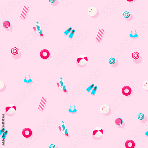 Trendy pattern of summer vacation accessories on a pink background. Summer and vacations concept