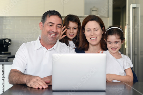 Family keeping in touch with elderly relatives online
