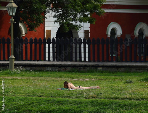 The girl on the grass Peter and Paul fortress Saint Petersburg Russia August 2019