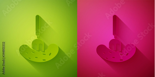 Paper cut Pickled cucumber on a fork icon isolated on green and pink background. Paper art style. Vector Illustration