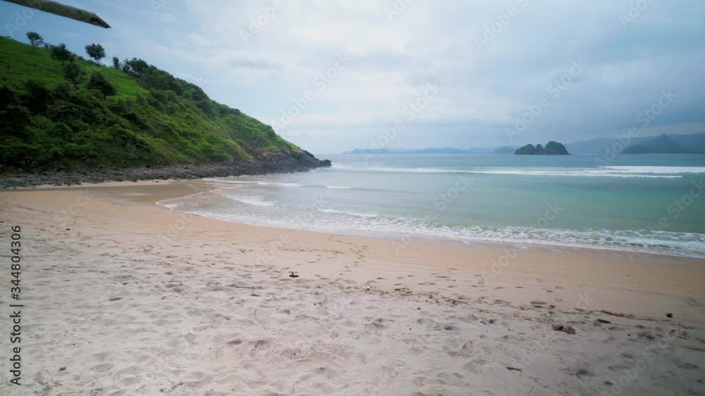 Panning shot of beach against sky, idyllic view of sea during sunset - Lombok, Bali Panning shot of beach against sky, idyllic view of sea during sunset - Lombok, Bali