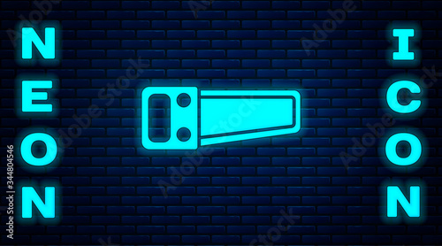 Glowing neon Hand saw icon isolated on brick wall background. Vector Illustration