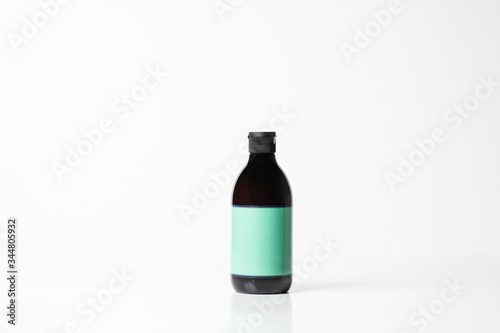 Black plastic bottle color label on a white background