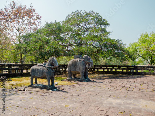 Hue, Vietnam - Mar 16, 2017: Stoned sculptures at outside located near of the Khai Dinh emperor in Hue, Vietnam. A UNESCO World Heritage Site