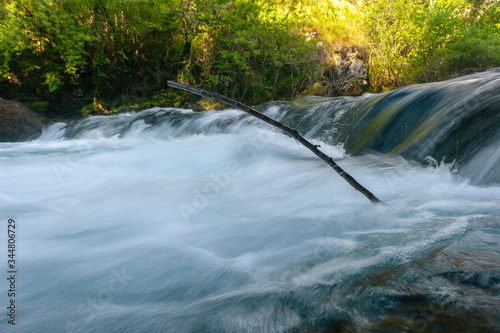 Waterfall on the Slunjcica River source in Croatia photo