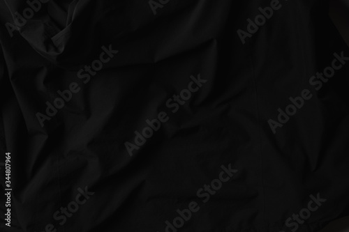 Close up of beautiful wrinkle black fabric texture.