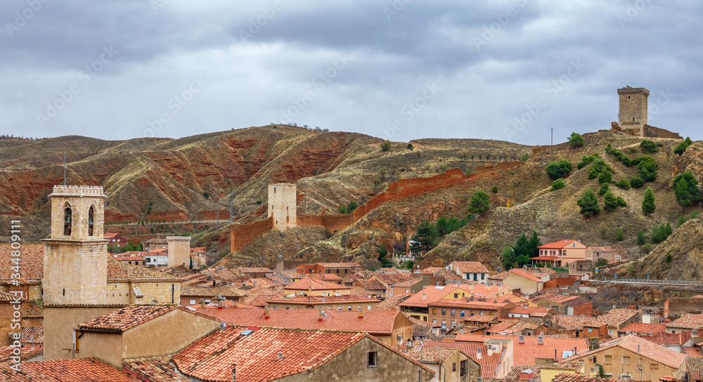 Tower, church and tile roofs in the antique village of Daroca