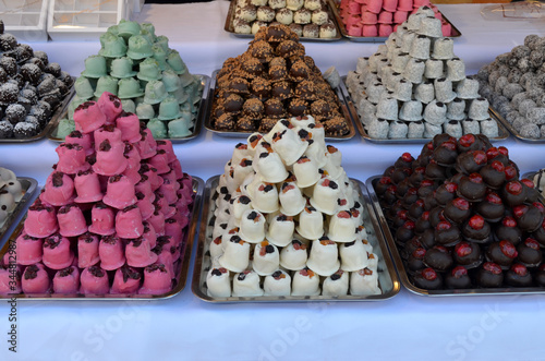 Many raws with chocolate candies at a street food market in Budapest, Hungary, tasty sugary food photographed with soft focus 