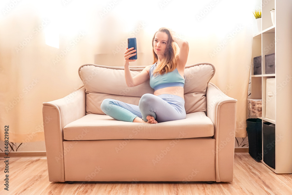 Fitness woman use mobile phone.