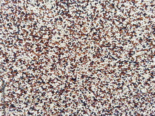 Food texture background from quinoa mix seeds. Stock photo.