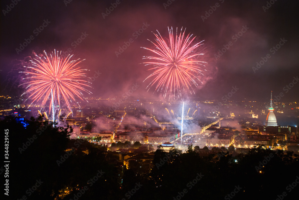 Panoramic view of Turin with fireworks at the feast of San Giovanni Panoramic view of Turin with fireworks at the feast of San Giovanni