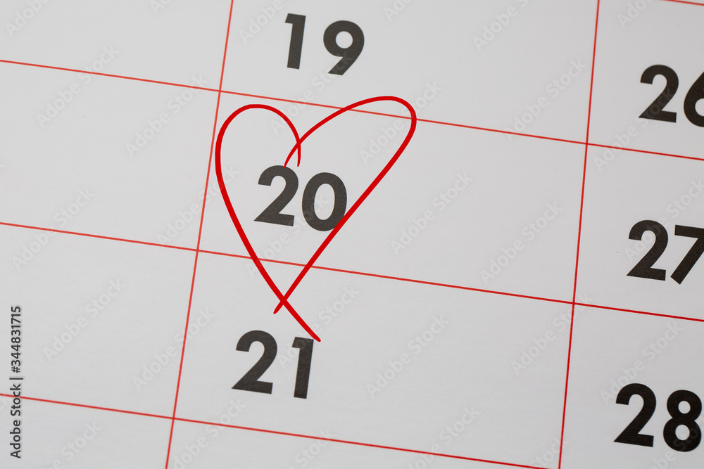 20th Date of the Month marked in red marker pen on a simple planner calendar 20th Date of the Month marked in red marker pen on a simple planner calendar