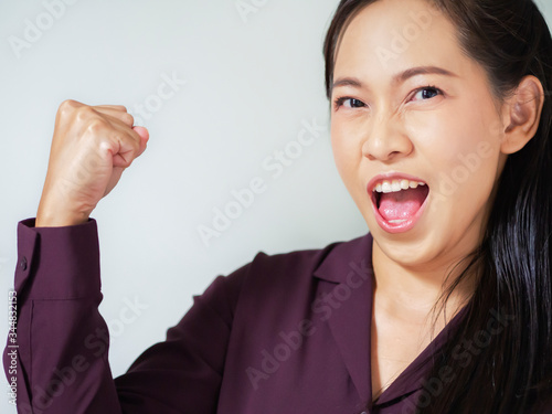 Fotografie Asian business woman is happy and cheerful emotion acting