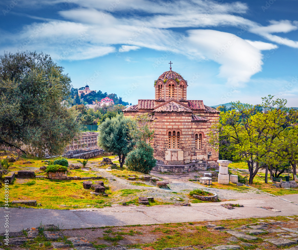 Sunny summer view of Church of the Holy Apostles, also known as Holy Apostles of Solaki or Agii Apostoli, located in the Ancient Agora of Athens, Greece. Traveling concept background..