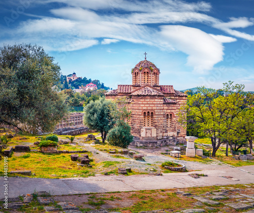 Sunny summer view of Church of the Holy Apostles, also known as Holy Apostles of Solaki or Agii Apostoli, located in the Ancient Agora of Athens, Greece. Traveling concept background.. photo