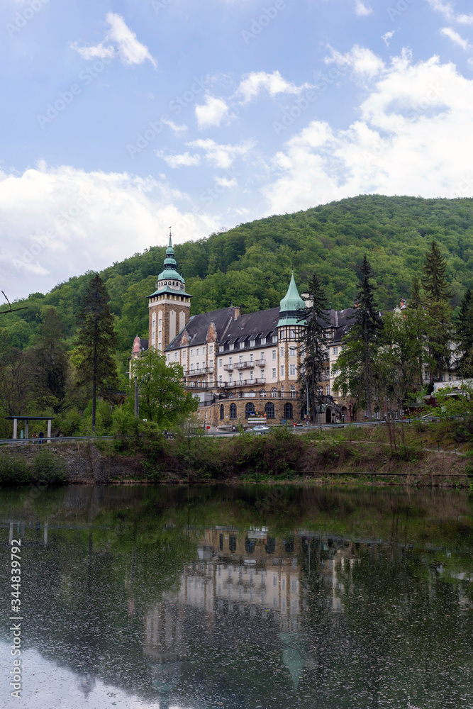 Lake Hamori with the Lilafured palace and Bukk mountains in the background