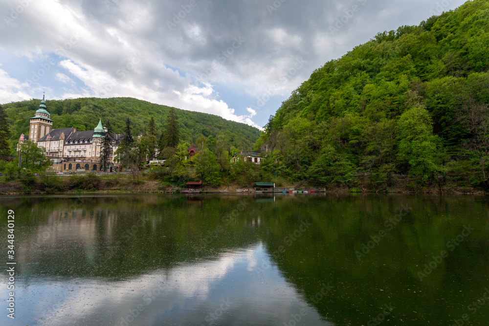 Lake Hamori with the Lilafured palace and Bukk mountains in the background