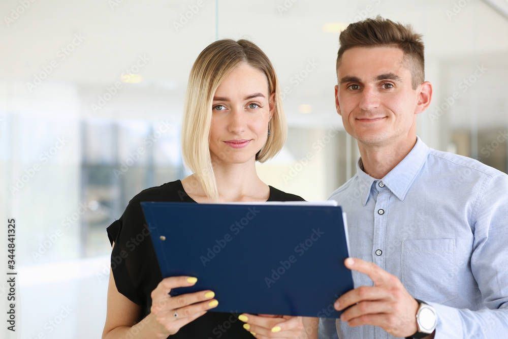 Fototapeta premium Beautiful woman portrait at workplace examining financial statistics. White collar worker at workspace, exchange market, startup, irs, certified public accountant, internal Revenue officer concept