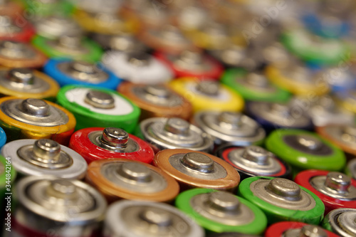 Many multicolored used batteries