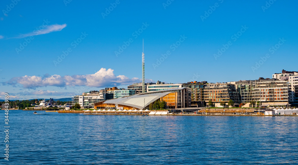 Oslo, Norway - Modern quarter of Tjuvholmen with Astrup Fearnley Museet museum, yachts and piers in Aker Brygge borough of Oslo at Oslofjord sea waterfront