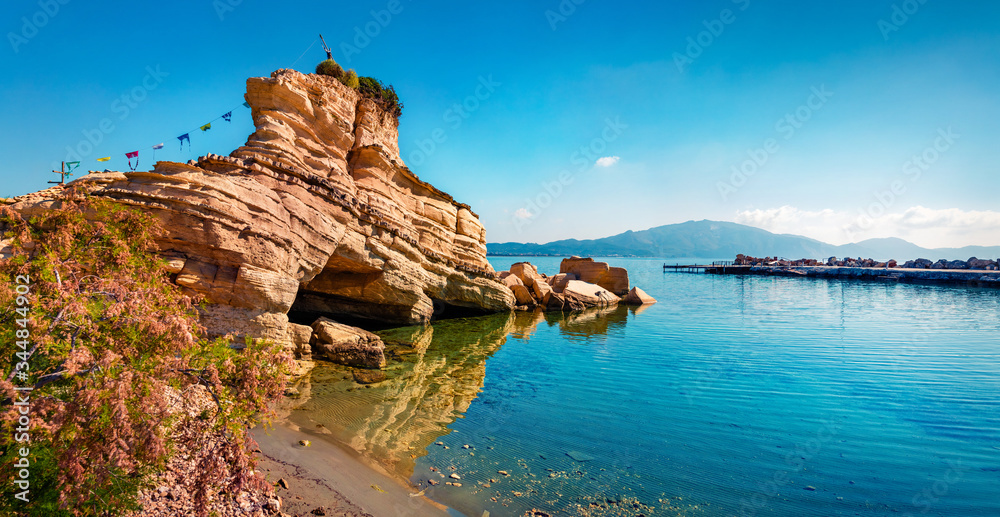 Sunny summer view of Port Sostis, Zakinthos island, Greece, Europe. Stunning morning seascape of Mediterranean sea. Traveling concept background..