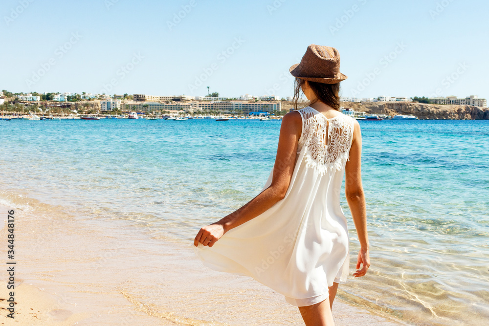 Beautiful woman is having fun near the sea. Enjoy your summer concept Beautiful woman is having fun near the sea. Enjoy your summer concept