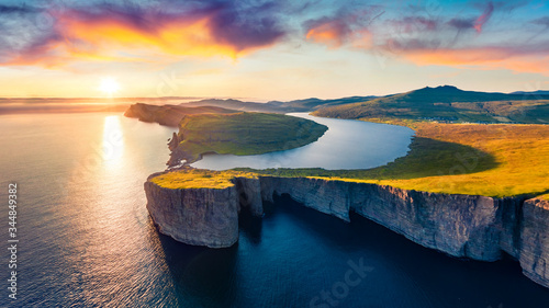 View from flying drone. Splendid evening scene of Sorvagsvatn lake, Vagar, Faroe Islands, Denmark, Europe. Unbelievable summer sunset on Atlantic Ocean. Incomparable beauty of the north.