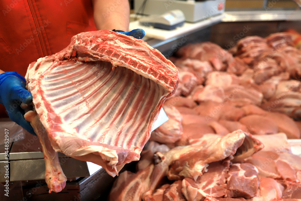 Fresh lamb meat at a meat store or marketplace.