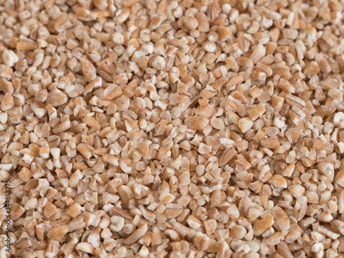 Fine Ground wheat groats pattern texture close up