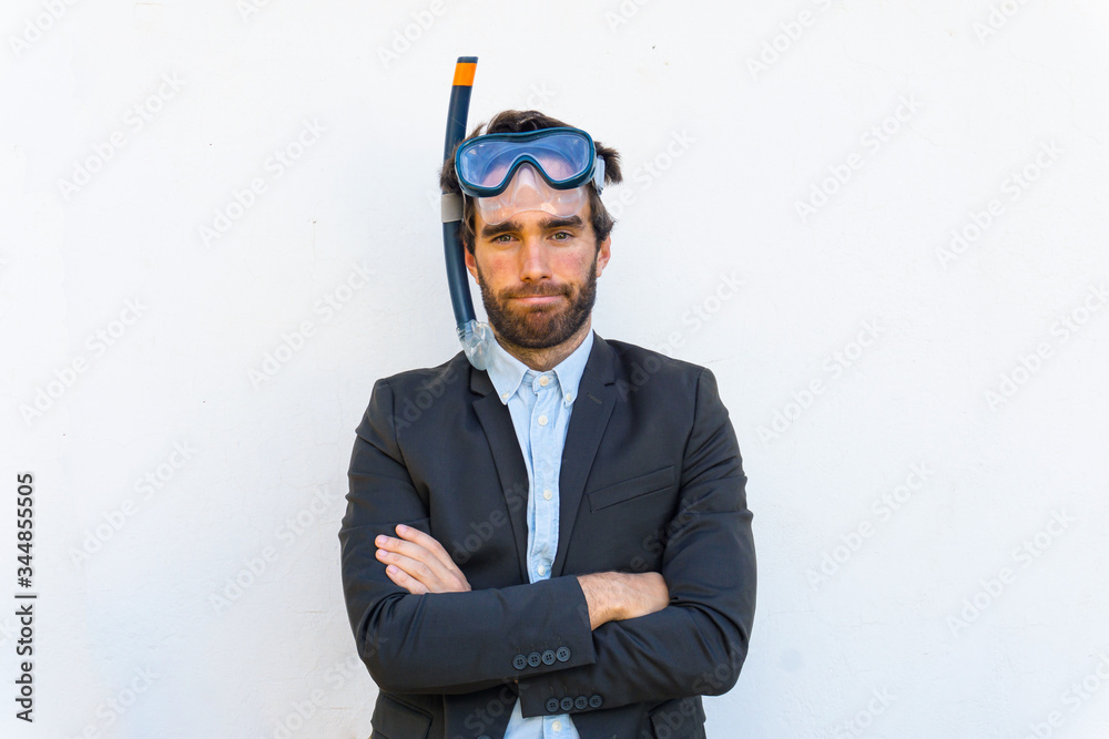 Businessman dreams with beach holidays. Snorkeling goggles. Dream, vacancies, beach concept. Businessman dreams with beach holidays. Snorkeling goggles. Dream, vacancies, beach concept.