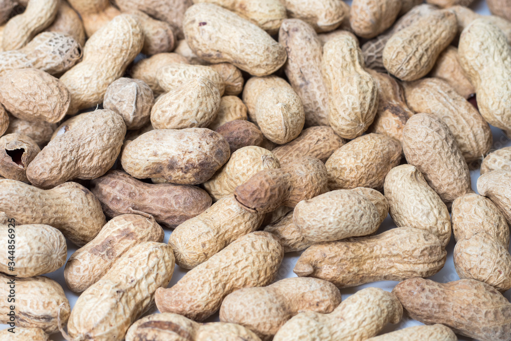 peanut in a shell texture. food background of peanuts peanut in a shell texture. food background of peanuts