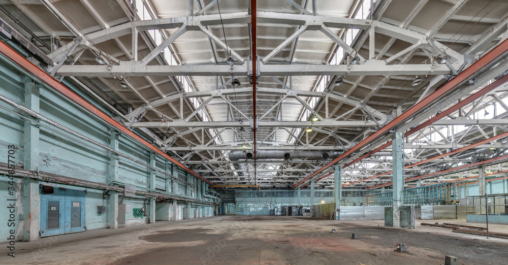 Fototapeta premium The interior of an empty production hall.
