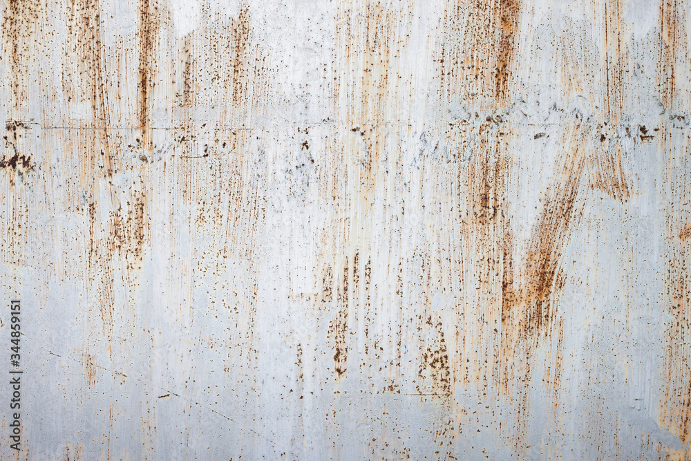 Steel sheet with rust. Metal texture with scratches. Material for design, background. Steel sheet with rust. Metal texture with scratches. Material for design, background.
