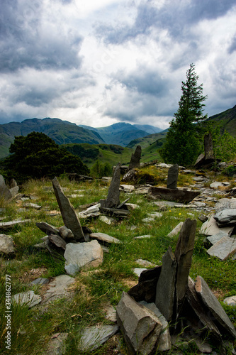 Фотография Slate sticks out of the ground at Castle Crag, Lake District, UK