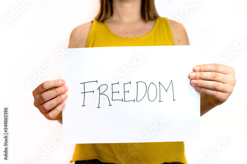 girl holding a freedom sign photo