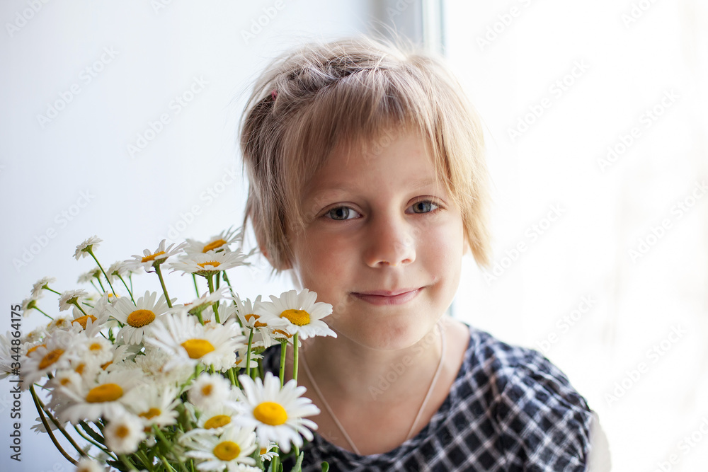 Portrait of a pretty little girl with bouquet of daisies Portrait of a pretty little girl with bouquet of daisies