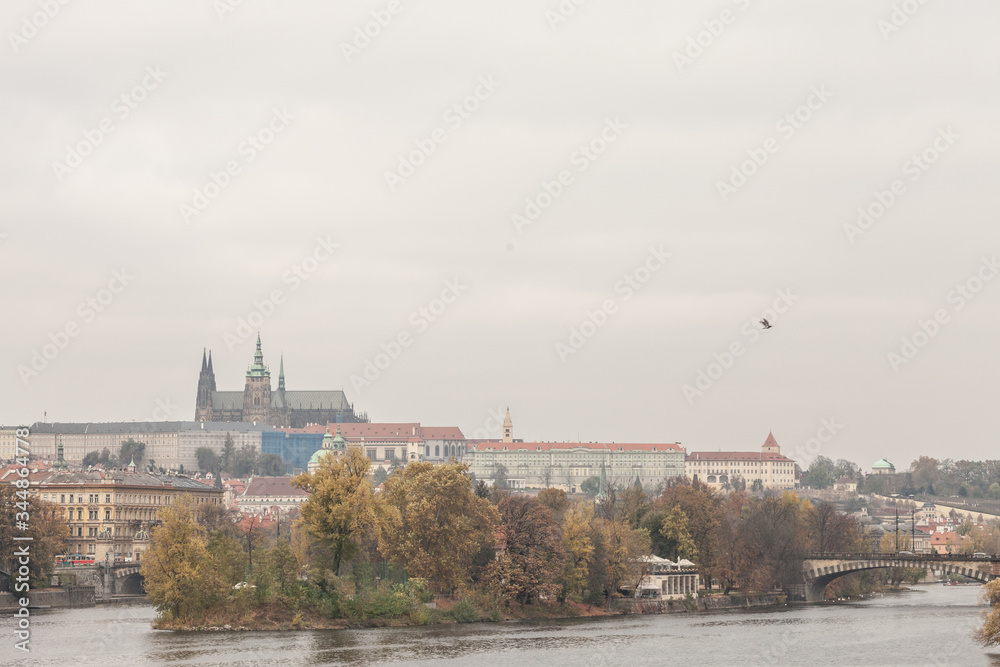 Panorama of the Old Town of Prague, Czech Republic, with a focus on Charles bridge (Karluv Most)  and the Prague Castle (Prazsky hrad) seen from the Vltava river. 