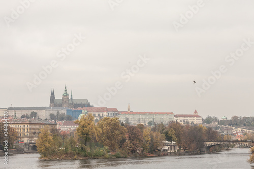 Panorama of the Old Town of Prague, Czech Republic, with a focus on Charles bridge (Karluv Most) and the Prague Castle (Prazsky hrad) seen from the Vltava river. 