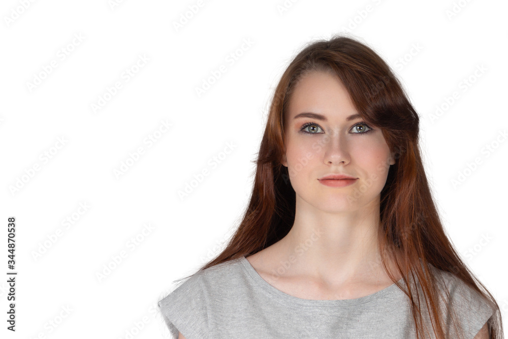 Portrait of a young girl with brown hair on a white background Portrait of a young girl with brown hair on a white background