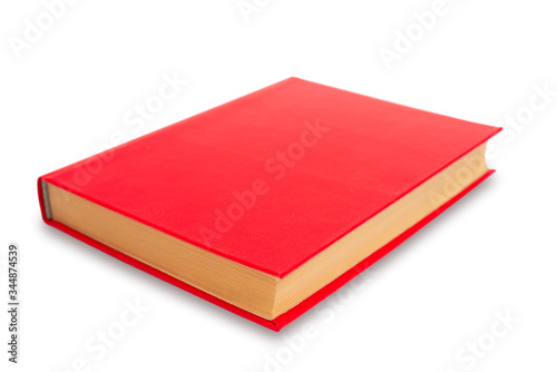 Book in red cover on white background. Old paper book.