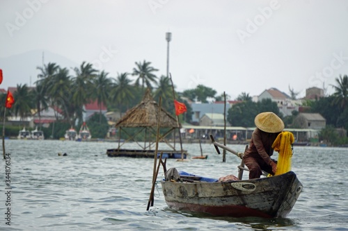 vietnamese fisherman fishing with net © chriss73