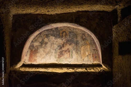 Beautiful shot of a religious painting in Catacombs of San Gennaro, Rione SanitÃ , Naples, Italy photo