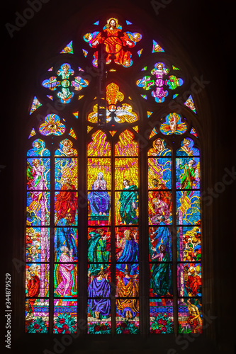 Colored stained glass windows of a medieval castle