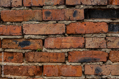 old crumbling abandoned brick wall